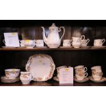 A Royal Albert floral design tea service 21 pieces, and a Royal Albert Silver Maple pattern coffee
