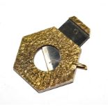 A 9 carat gold cigar cutter of hexagonal form