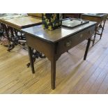 An 19th century oak side table, with long frieze drawer and square legs, 104cm wide 71.5cm high