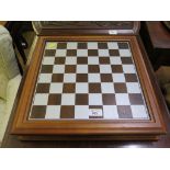 A Danbury Mint Camelot chess set, with pewter pieces in fitted chessboard box with certificate and