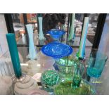 Various coloured glass including blue flared-rim bowl 19cm diameter, three slender vases, 20cm to