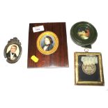 An early 19th centrury miniature portrait of a young gentleman 6cm high in a rosewood frame, a cut