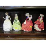 Royal Doulton figures: Sandra HN2401, Gift of Love HN3427, Autumn Breezes HN1934 and Top o' the Hill