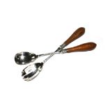 A pair of Mappin and Webb silver plated salad servers with oak wood handles