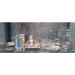 Eleven items of silver plate to include candlesticks, tea caddy, etc
