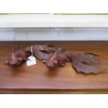 A pair of Japanese antique hand carved wood koi carp fish, with glass eyes, 21cm long