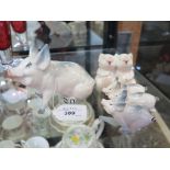 Five Beswick novelty pig figures