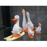 Four Beswick novelty geese figures, including one skiing