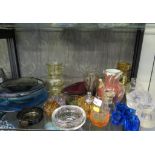 A large collection of 1960s coloured glassware, including Whitefriars type, candleholders, vases,