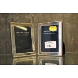 A pair of small silver Arthur Price photo frames with ribbon and beaded border, London 2001 and