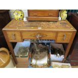 A 1920s walnut lady's writing desk, by Waring & Gillow, the leather inset top over three drawers