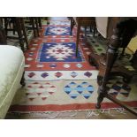 An Indian Kilim rug, with geometric design, 270cm x 194cm