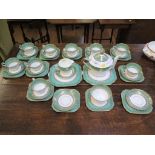 A Gladstone china tea service, with green bands and gilt decoration 38 pieces