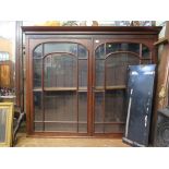 A Victorian mahogany bookcase top, the part protruding cornice over a pair of glazed doors, 161cm