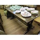 An oak refectory table, on baluster shaped fret carved supports and bracket feet, 77.5cm wide