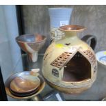 A Geoff Hartley pottery bowl on a raised cylindrical foot with brown shaded colours together with