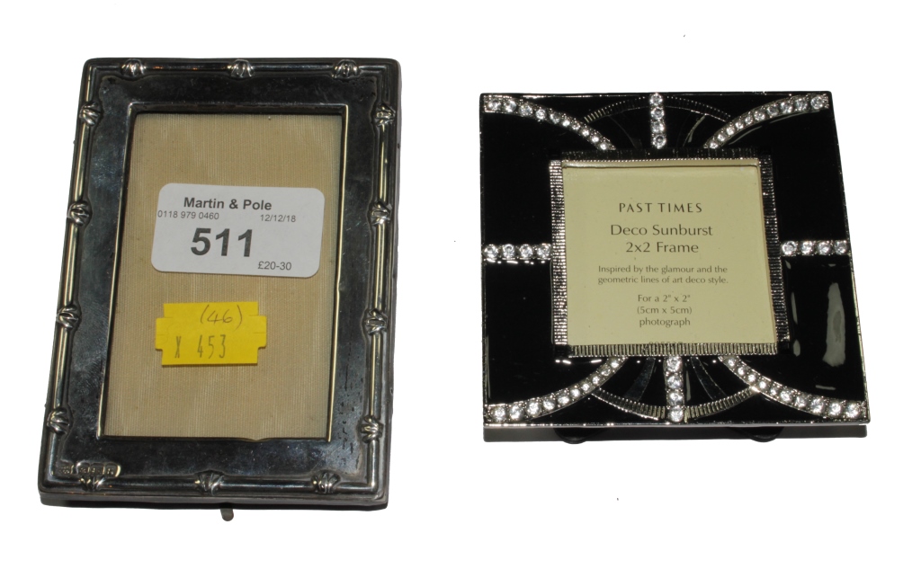 A small silver photo frame, Birmingham 1942, and a boxed Past Times deco sunburst photo frame