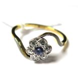 A diamond and sapphire posy ring