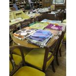 A set of six Edwardian carved walnut dining chairs with rail backs and turned legs, two further