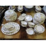 A Wedgwood Beaconsfield pattern dinner service, with two tureens, soup bowls, sauce boats etc (65