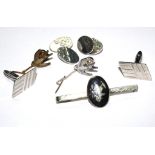 A pair of Sterling silver cufflinks, another pair of silver links, two tie tacks and a tie clip