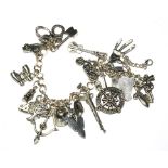 A silver charm bracelet of approximately eighteen charms