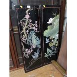 A pair of Chinese lacquer panels depicting birds and blossoming trees