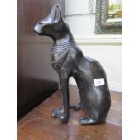 A bronze effect model of a seated Egyptian cat 38cm high