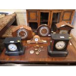 Two late Victorian slate mantel clocks with French movements, and four other mantel clocks (6)