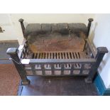 An iron fire grate, 53cm wide