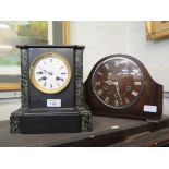 An Edwardain inlaid mahogany mantel clock with brass pillars and pad feet, enamel dial, French