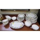 A Wedgwood Beaconsfield pattern dinner service including soup bowls and serving plates (42 pieces)