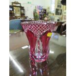 A Val St Lambert red overlay glass vase of tulip form 15cm high