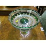 A green overlay glass pedestal fruit bowl with quatrefoil border 23cm diameter