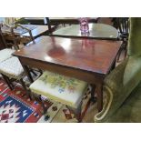 A cross banded mahogany foldover tea table, boxwood and ebony strung frieze on square section