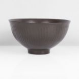 David Leach (British, 1911-2005) Large Fluted Bowl Porcelain, dark brown glaze over a finely