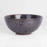 Charles Vyse (British, 1882-1971) Small Bowl, 1929 Stoneware, deep burgundy glaze, the well