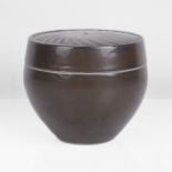 David Leach (British, 1911-2005) Small Lidded Pot Porcelain, dark brown glaze, the flat top with