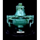 A CHINESE JADEITE URN AND COVER with dragons head mounts and ring handles, 15cm wide