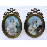 A PAIR OF LATE 19TH / EARLY 20TH CENTURY MINIATURE OVAL PORTRAITS featuring young maidens, each