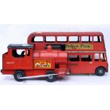 A TRI-ANG PUFF PUFF TOY TRAIN 45cm in length and a Tri-Ang London Transport bus 57cm in length (2)