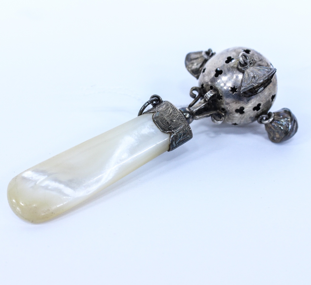 AN ANTIQUE SILVER AND MOTHER OF PEARL CHILD'S RATTLE 10cm long