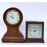 A SATINWOOD CASED BALLOON SHAPED MANTLE CLOCK or timepiece, the dial with Roman numerals and