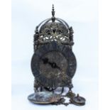 A 17TH CENTURY STYLE BRASS LANTERN CLOCK the dial signed Thomas Moore Ipswich, overall 36cm in