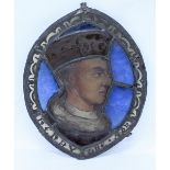 A STAINED GLASS OVAL PANEL depicting a head and shoulder portrait of King Henry V, 33cm in height