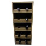 A LIGHT OAK VENEER WINE RACK and contents therein to include sherry, madeira etc (8 bottles)