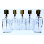 A SET OF FIVE PUMP SPIRIT DECANTERS with acid etched decoration to include Rum, Gin, Bourbon and