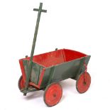 AN OLD GREEN AND RED PAINTED CHILD'S WAGON with removable ends, 71cm long (not including handle)