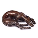MUHMOOD TAHIR (21ST CENTURY SCHOOL) 'Resting Greyhound', bronze, signed, 11.5cm wide (ARR)