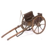 A 20TH CENTURY MODEL DOG CART AND WHIP 110cm x 35cm